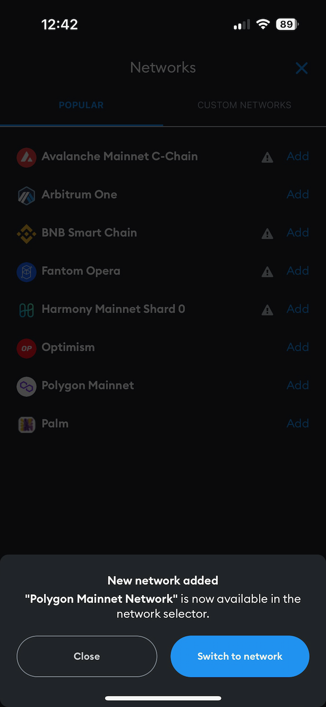 Schermafbeelding Metamask waarin het Polygon netwerk wordt ingesteld als actief netwerk.